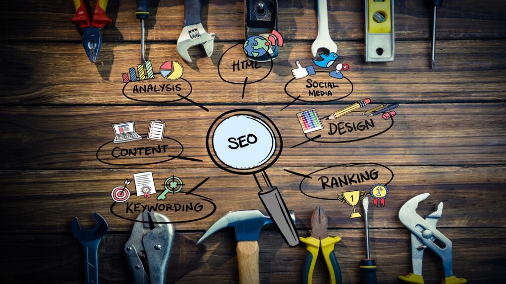 A collection of SEO tools displayed on a wooden table, showcasing various instruments for digital marketing analysis.