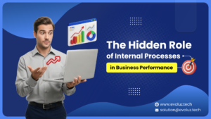professional analyzing growth charts on a laptop representing how internal business processes impact overall performance and productivity.